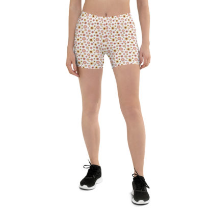 SIPPA korta leggings med rosa och gula blommor på vit bakgrund