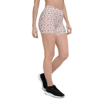 SIPPA korta leggings med lila och rosa blommor på vit bakgrund